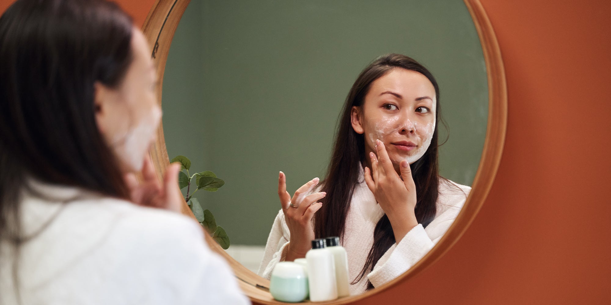 Woman performing skin care