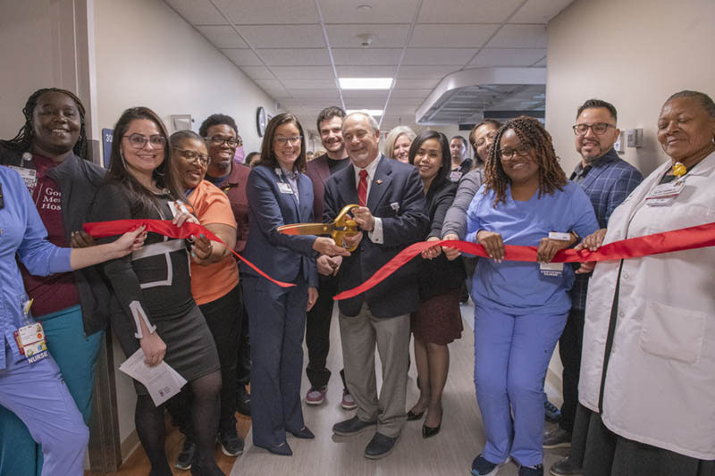 Gottlieb team cutting ribbon