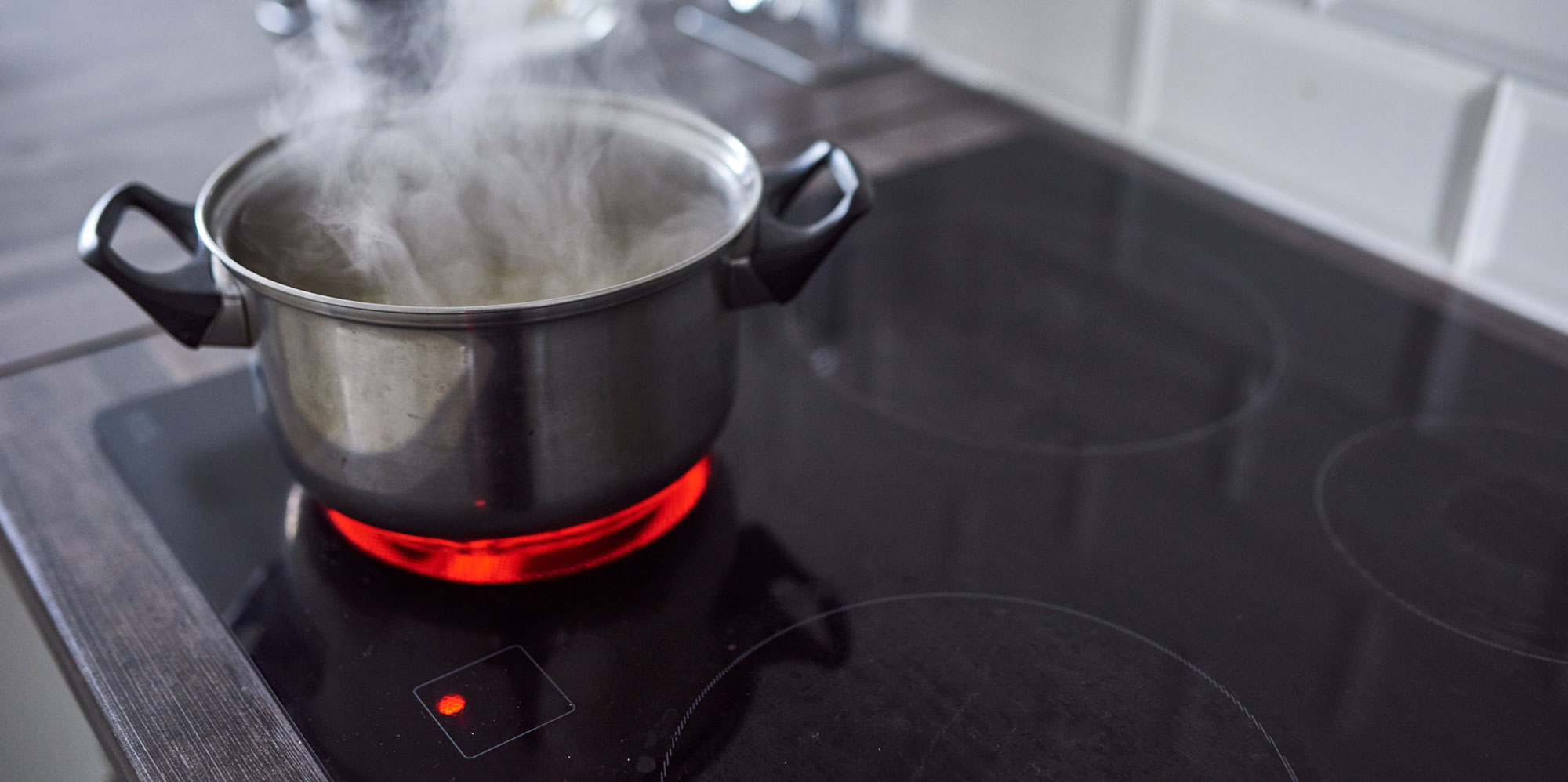 Hot boiling water on stove