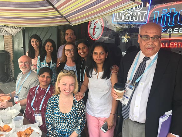 Fellows and faculty eating