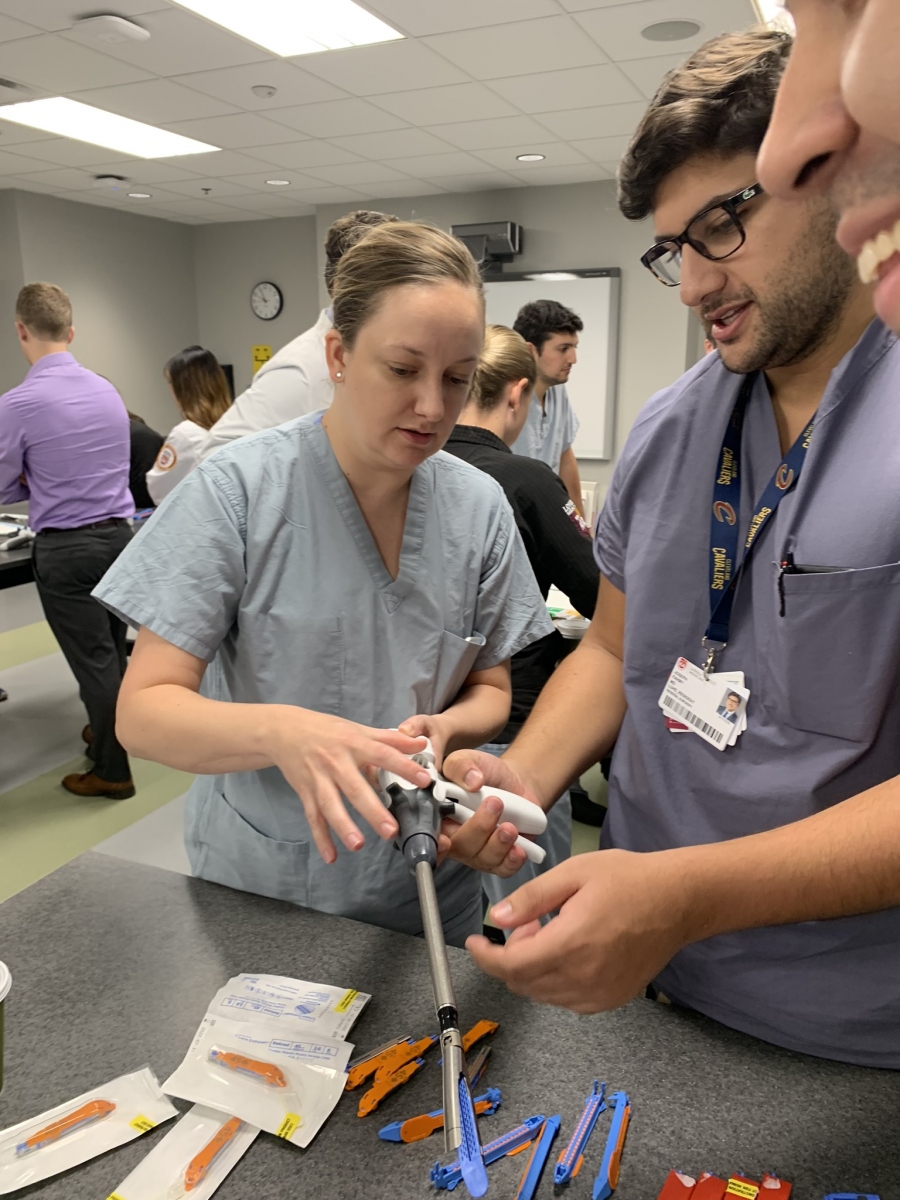 Residents practicing surgery techniques