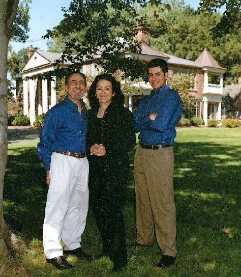 Tarik and his parents, Drs. Fikry and Mona Ibrahim, in front of their home. Grosse Pointe Shores, MI