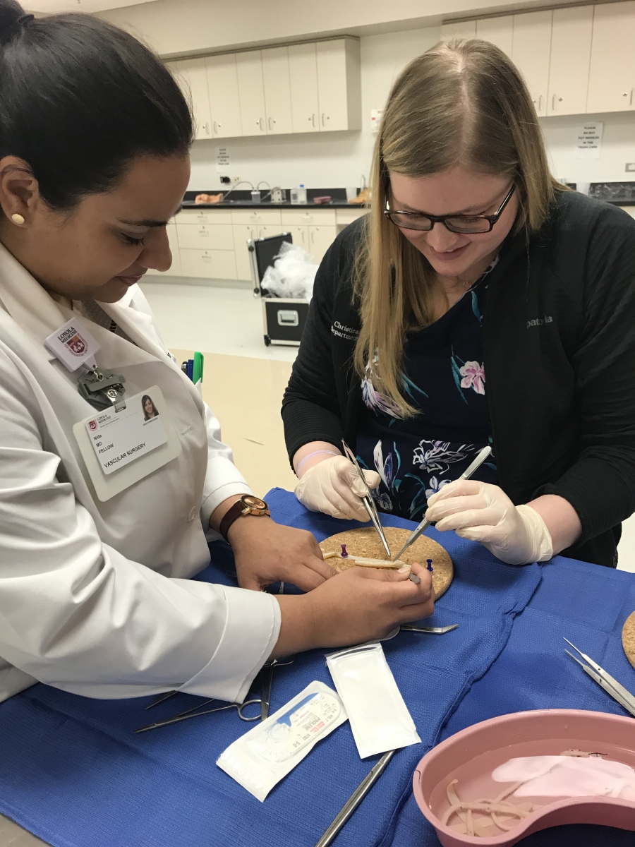 Residents practicing surgery techniques