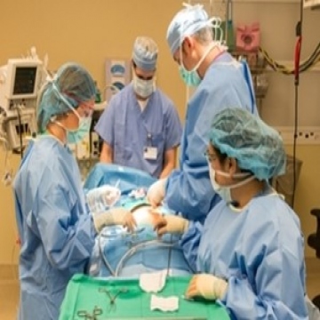 Doctors Performing Surgery